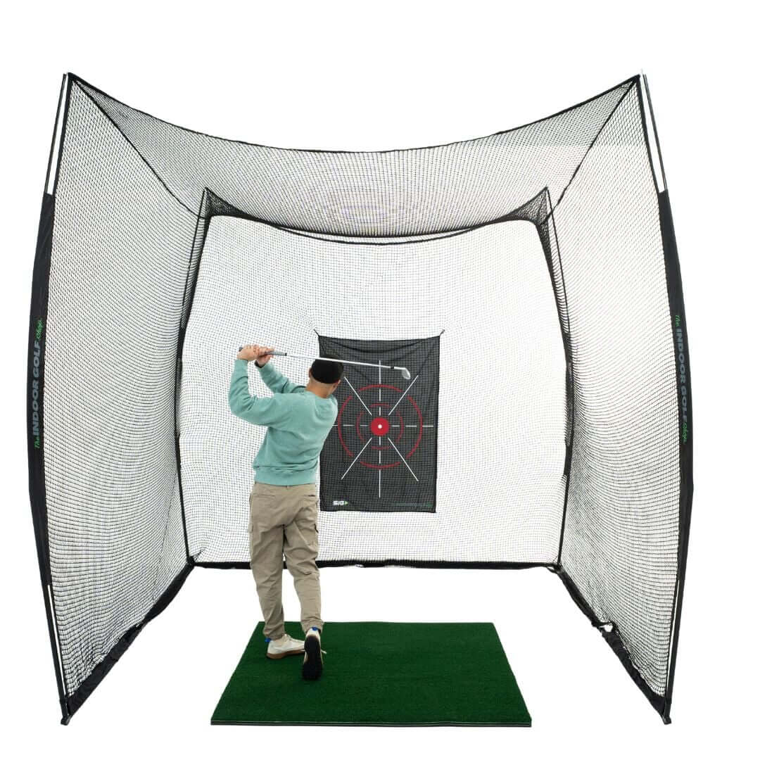 Person practicing golf swing in 10' x 10' x 10' Square Golf Net with target.