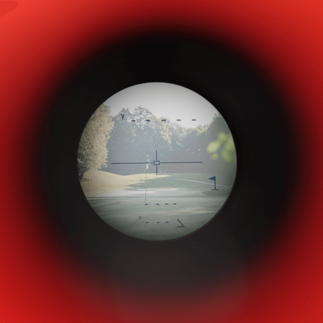 View through the Talon X1 Slope Rangefinder showing a golf course with a flag.