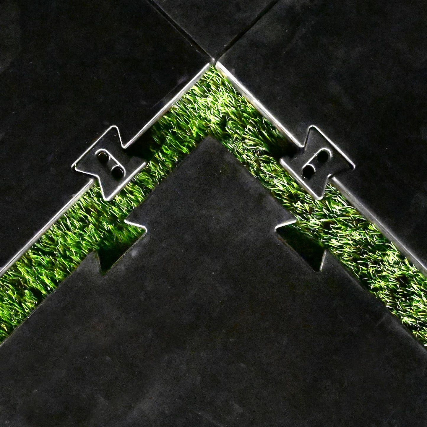 Close-up of Carl's Place HotShot Golf Mat Base with interlocking sections and realistic turf detail for stable practice foundation.