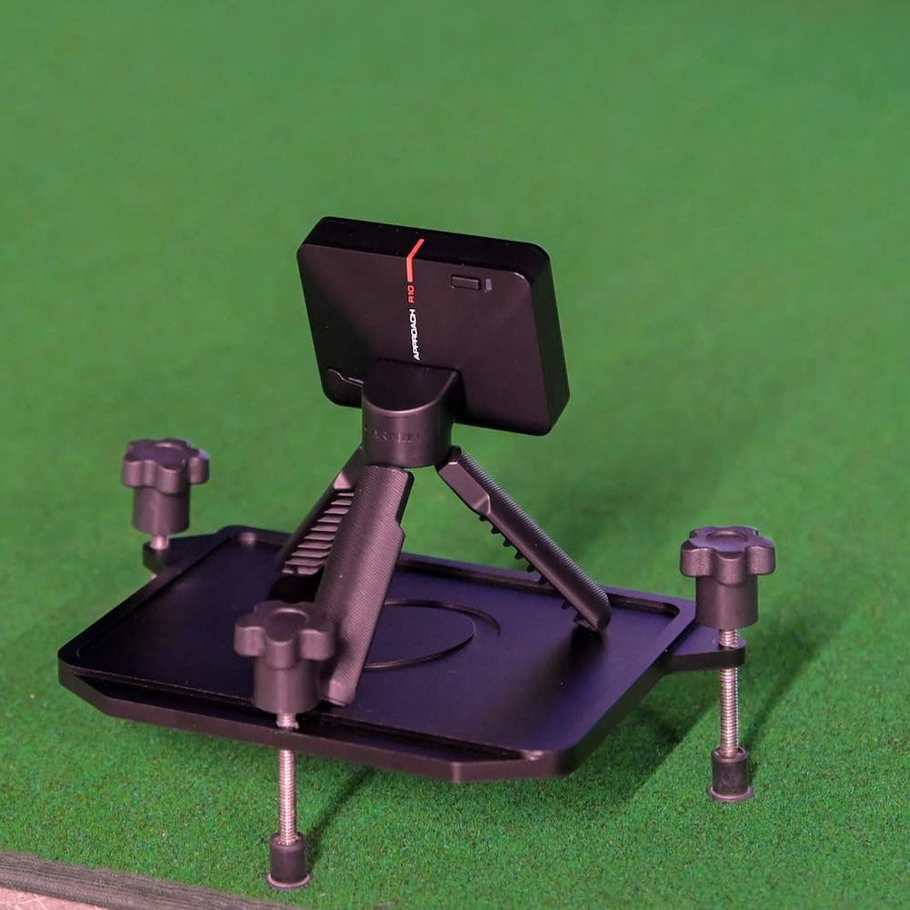Carl's Place Launch Monitor Alignment Stand positioned on golf green, ensuring accurate shot alignment.