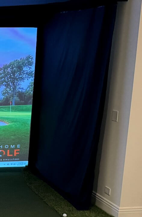 SIG Golf Simulator Curtains installed in a home golf setup for enhanced projection clarity.