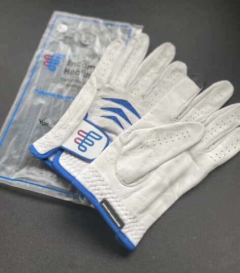 Custom Through Touch Glove displayed with packaging, showcasing premium design and functionality.