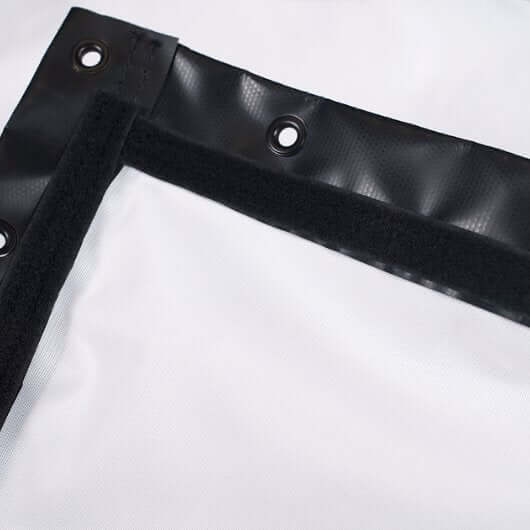 Close-up of the edge and grommets on the SIG Preferred Finished Golf Impact Screen showing finished edges.