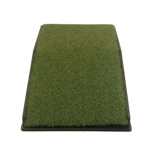 Golf Simulator Projector Floor Mount Enclosure with synthetic grass surface for indoor golfing.