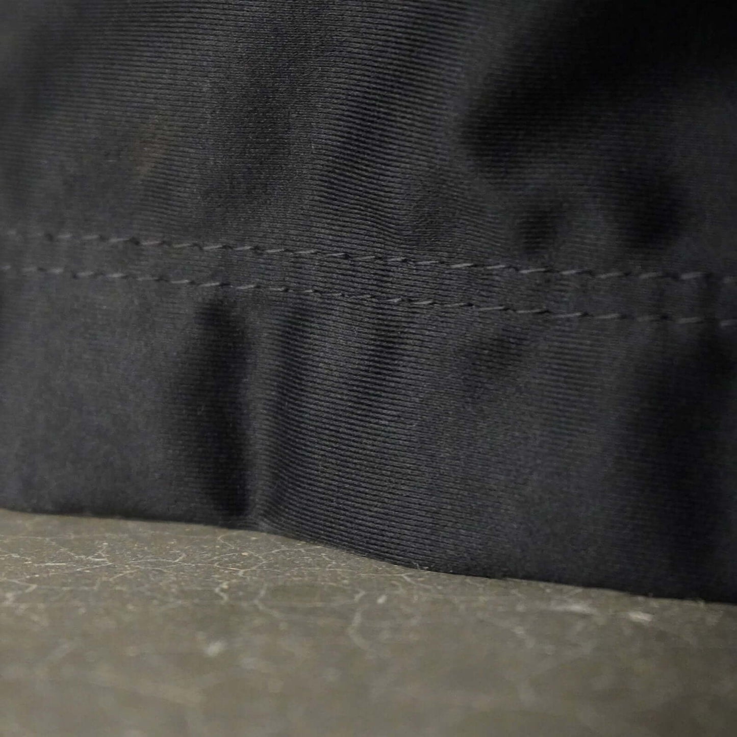 Close-up of fabric detailing on Carl's Place Golf Room Curtain, showcasing quality material and a smooth finish.