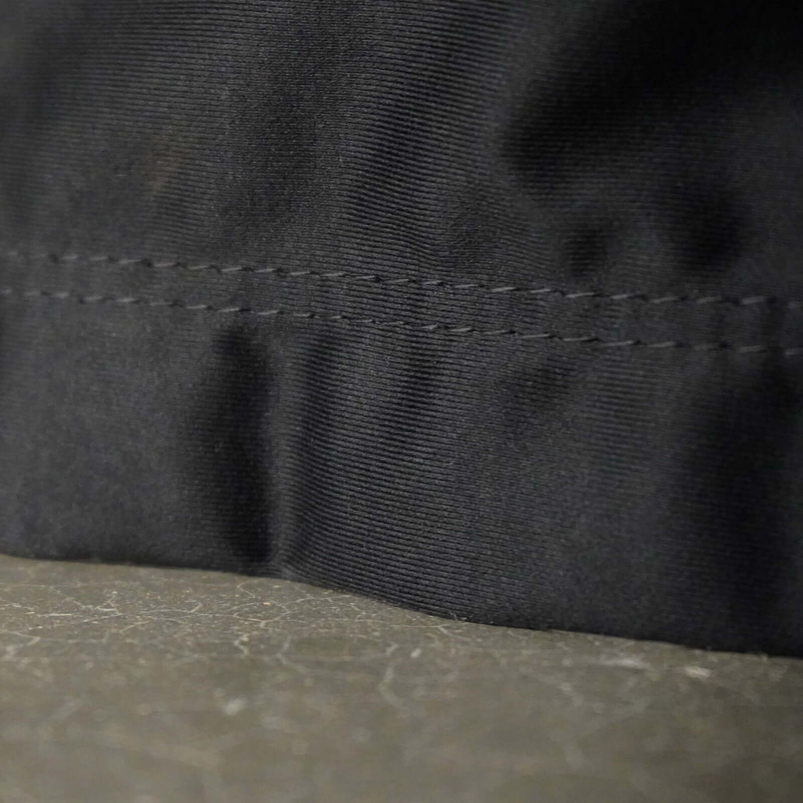 Close-up of fabric detailing on Carl's Place Golf Room Curtain, showcasing quality material and a smooth finish.