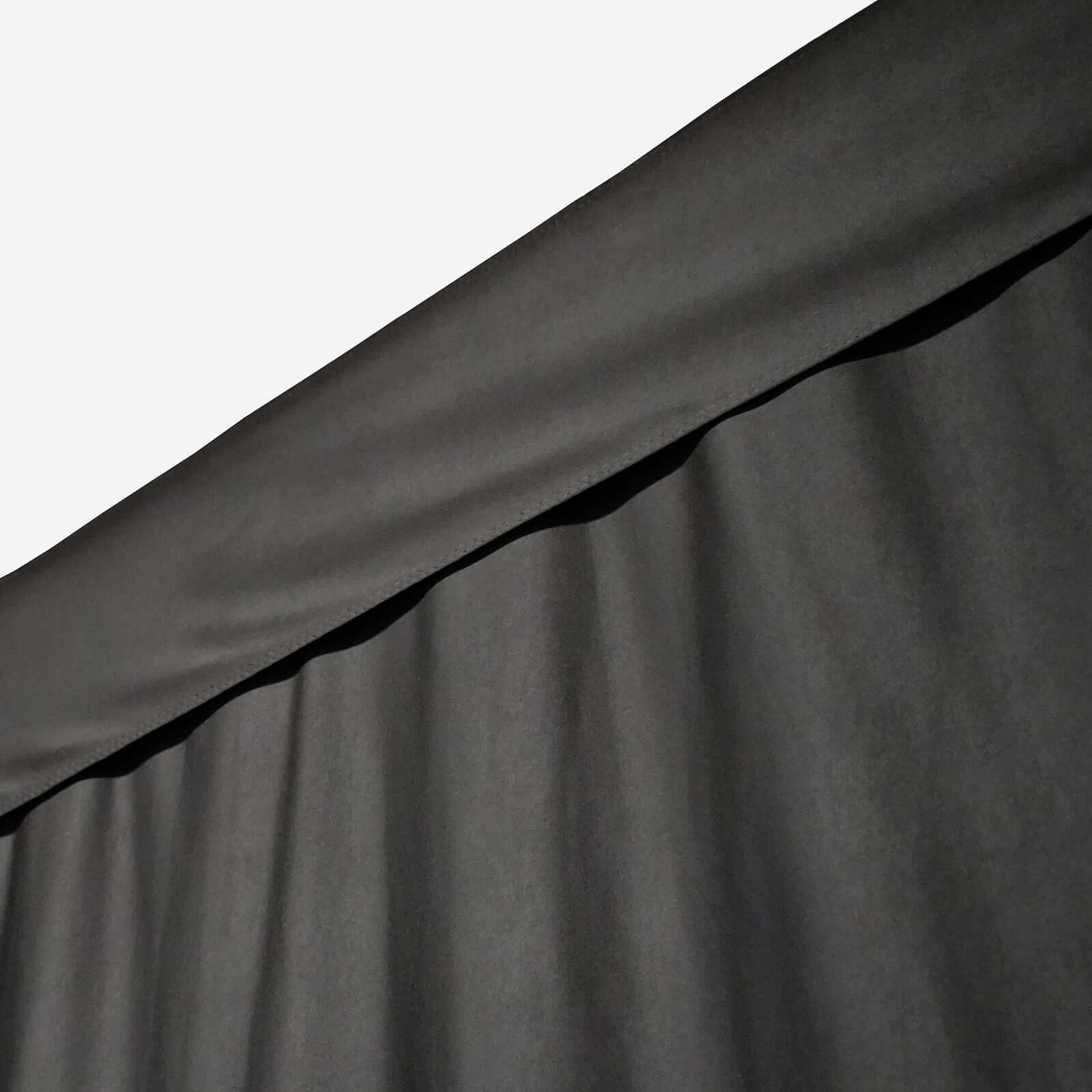 Close-up view of Carl's Place Golf Room Curtain fabric, designed for golf simulator enclosures.
