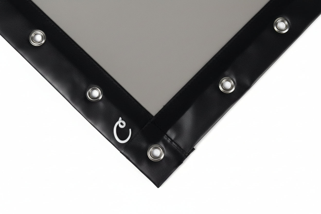 Carl's Place Gray Impact Screen Finished With Black Vinyl Edges and Grommets corner detail with grommets.
