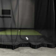 Carl's Place Net Curtain enhancing a golf simulator enclosure with visibility and airflow.