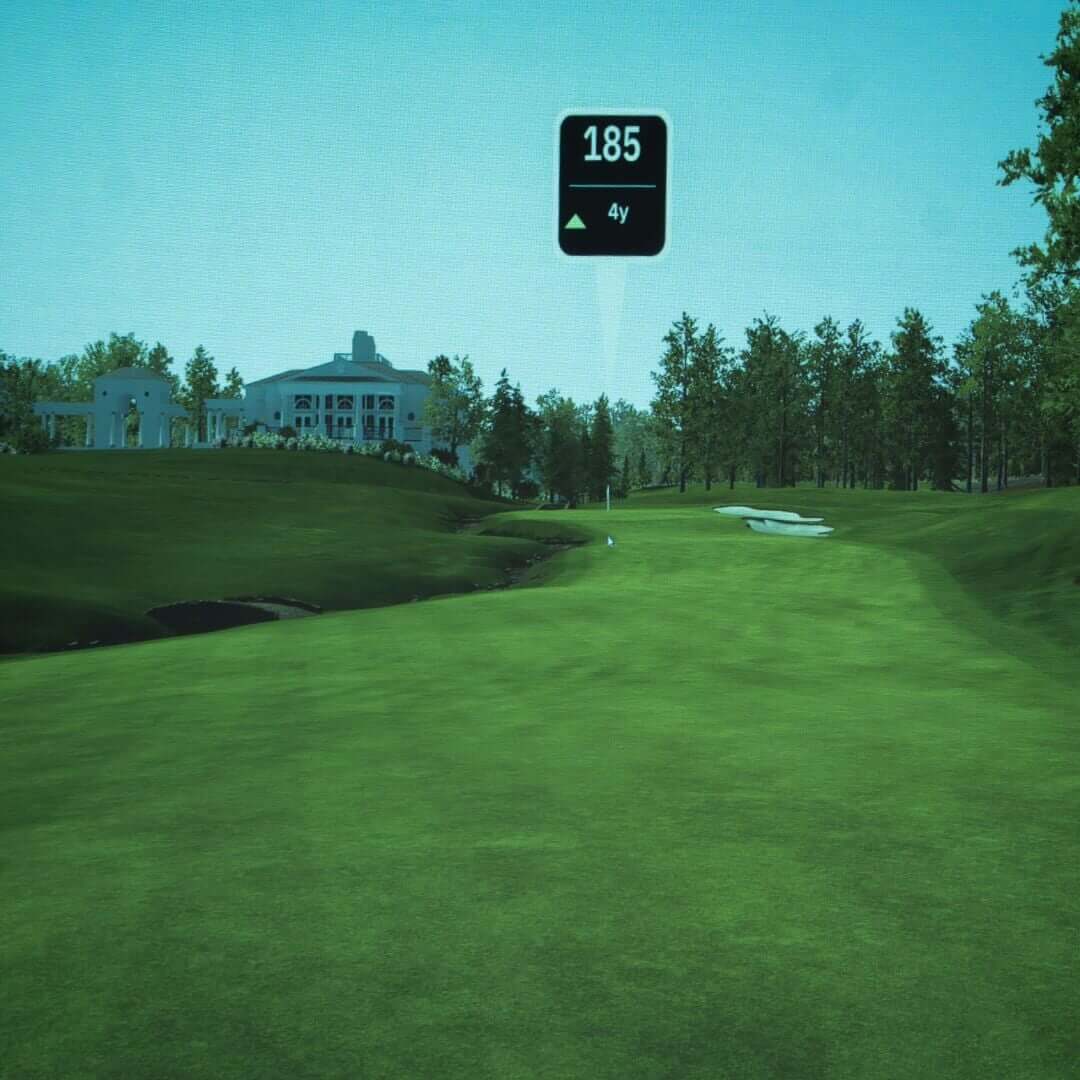 SIGPRO Premier Golf Simulator Impact Screen displaying distance and course details for an enhanced golfing experience.
